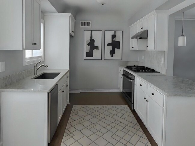 Updated Kitchen - 10239 S 8th Ave Apartments