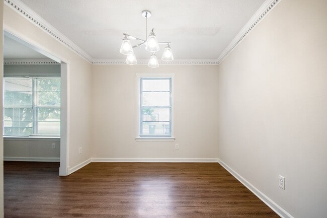 Building Photo - Spacious Renovated Home with Fenced Yard !