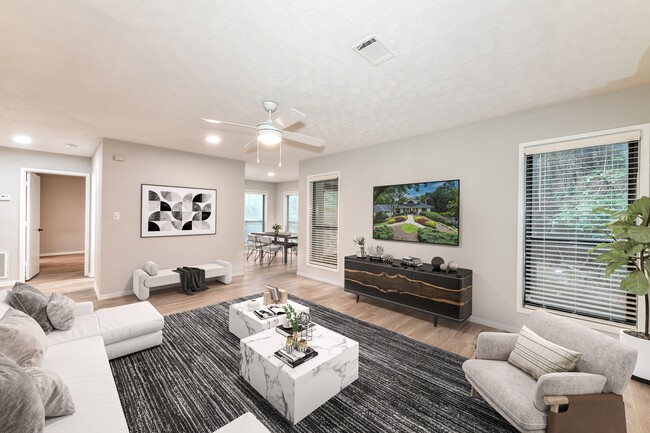 Spacious living room looking toward dining area - Avana Chase