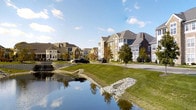 Located at 11289 E Hamilton Cres in Fishers, Indiana, this single-story property sits within a beautifully developed neighborhood that blends architectural variety with natural landscapes. The community setting is a standout feature, characterized by a serene pond that reflects the surrounding greenery and sky, creating a tranquil and visually appealing environment. Well-manicured lawns, mature trees, and stone-accented water features contribute to the neighborhood's polished, welcoming aesthetic. The area showcases a mix of traditional and contemporary architectural styles, with multi-story neighboring homes featuring brick and siding exteriors, pitched rooflines, and classic detailing that speak to the quality and character of the community. Wide, tree-lined streets and open green spaces enhance the sense of openness and provide a pleasant outdoor atmosphere throughout the neighborhood. The location in Fishers, IN — consistently recognized as one of the most livable cities in the United States — adds to the appeal, offering residents access to top-rated schools, parks, and community amenities. This property offers a compelling opportunity to enjoy comfortable single-floor living within a vibrant, thoughtfully planned community.