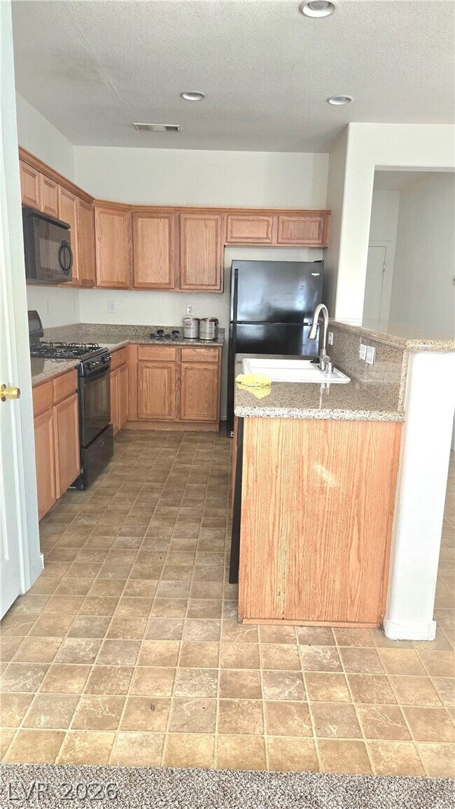 Foto del edificio - 9063 Spring Star Ct
