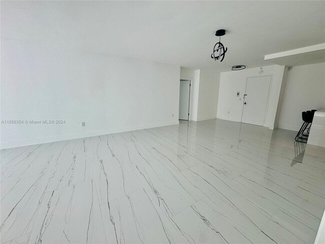 Building Photo - 9801 Collins Ave