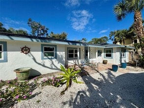 Building Photo - 7372 Melaleuca Way