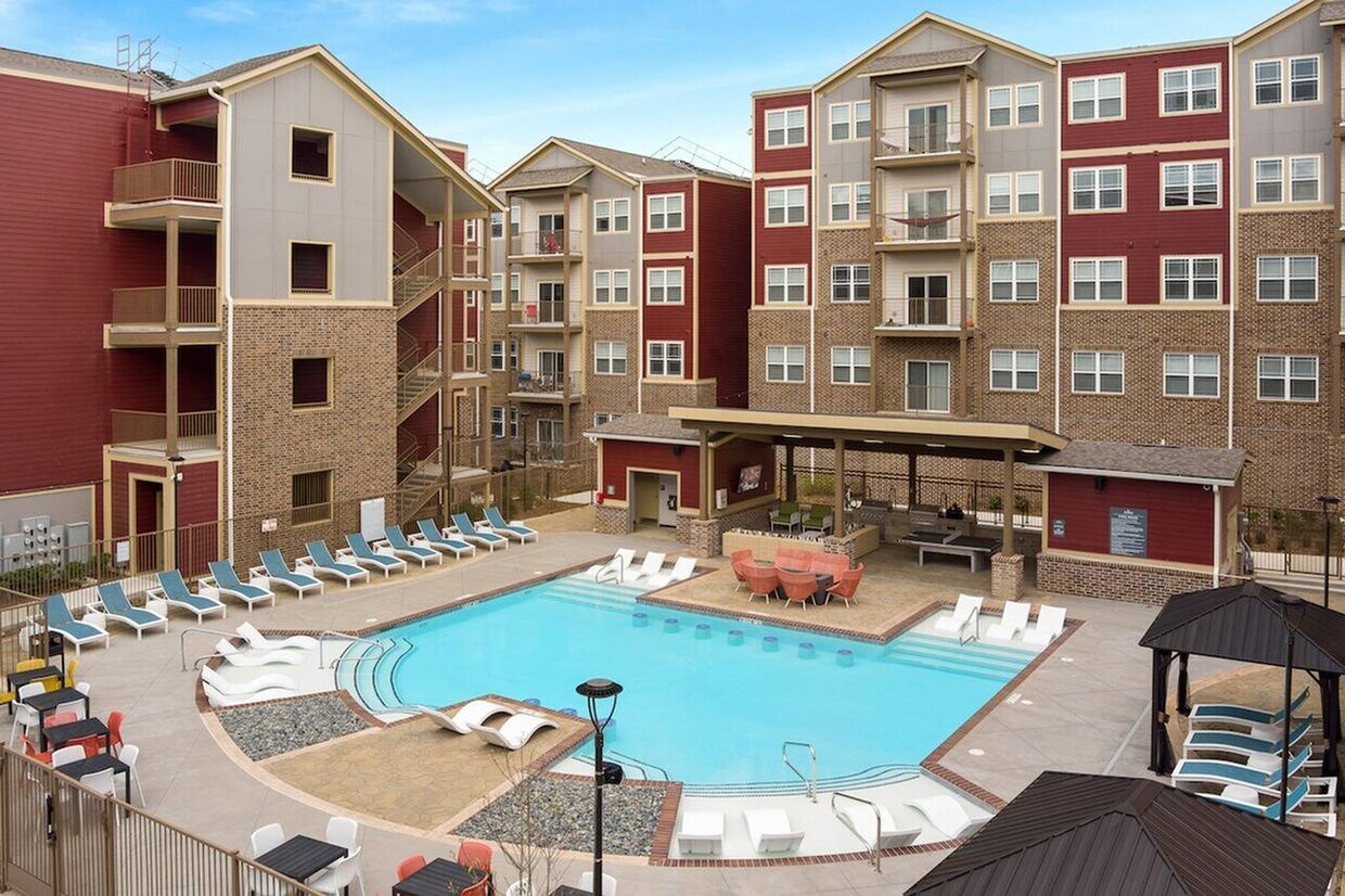 This is what the apartment buildings and pool/lounge area look like. - 1244 N Haven Dr
