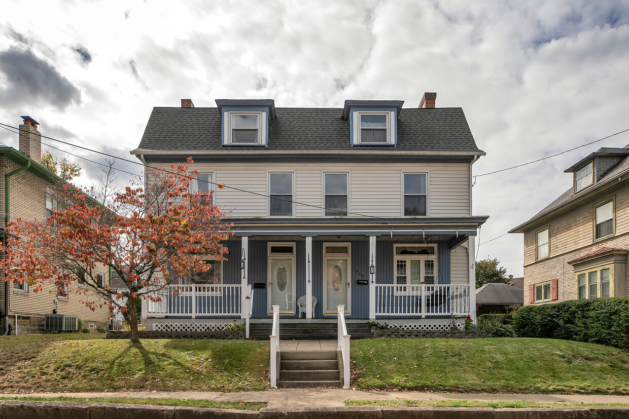 The 4 bedroom home is located on the left side of the photographed building. - 713 Clinton Pl