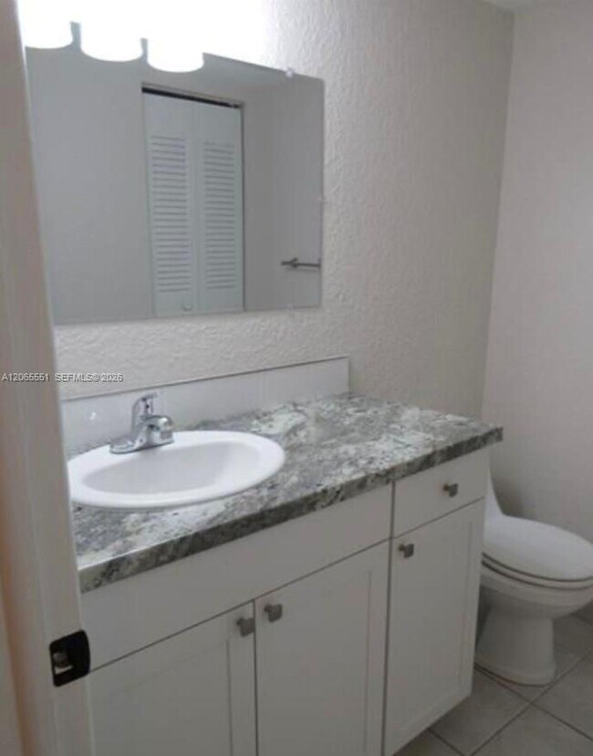 Building Photo - 10751 Royal Palm Blvd