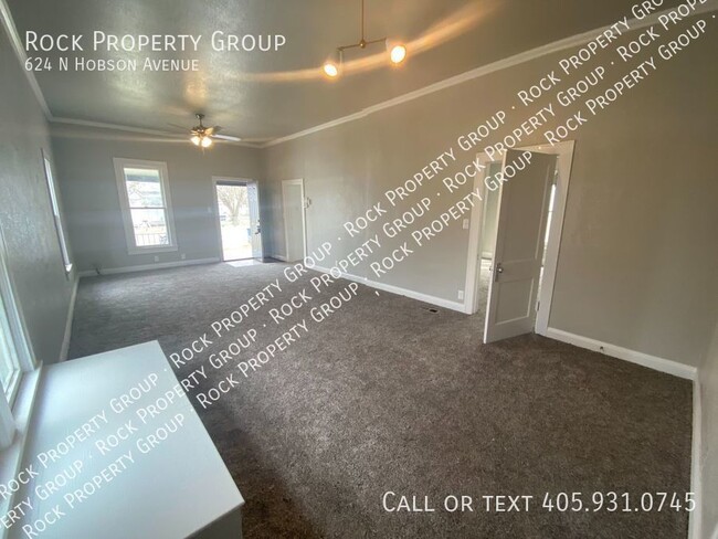 Building Photo - Three-Bedroom House with 1500 SF Outbuildi...