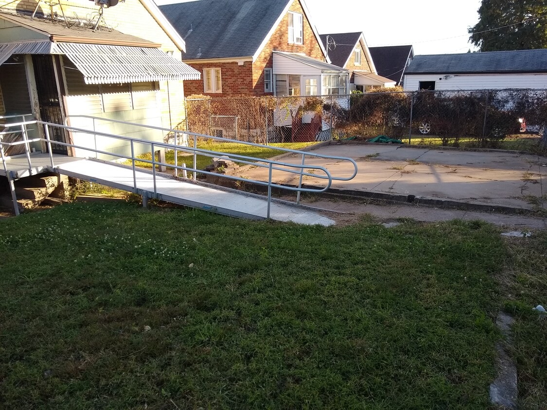 Rear View of wheelchair ramp and parking pad - 8739 Partridge Ave (St. Louis, MO)