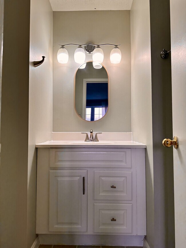 Private ensuite bathroom with standing shower (to the right, not shown). - 4767 Kandel Ct