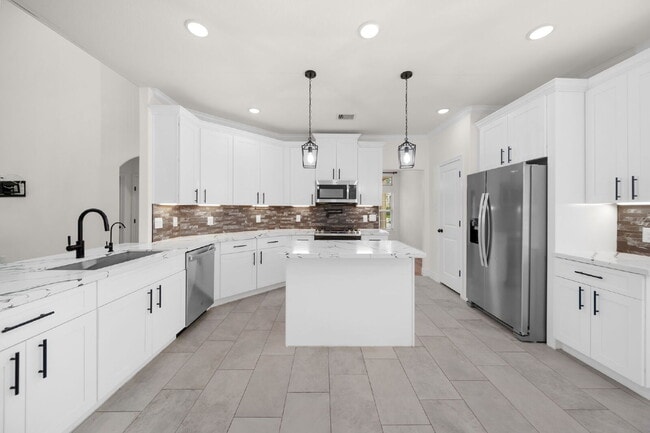 Building Photo - This is more than just a place to live - it's a place to feel at home.