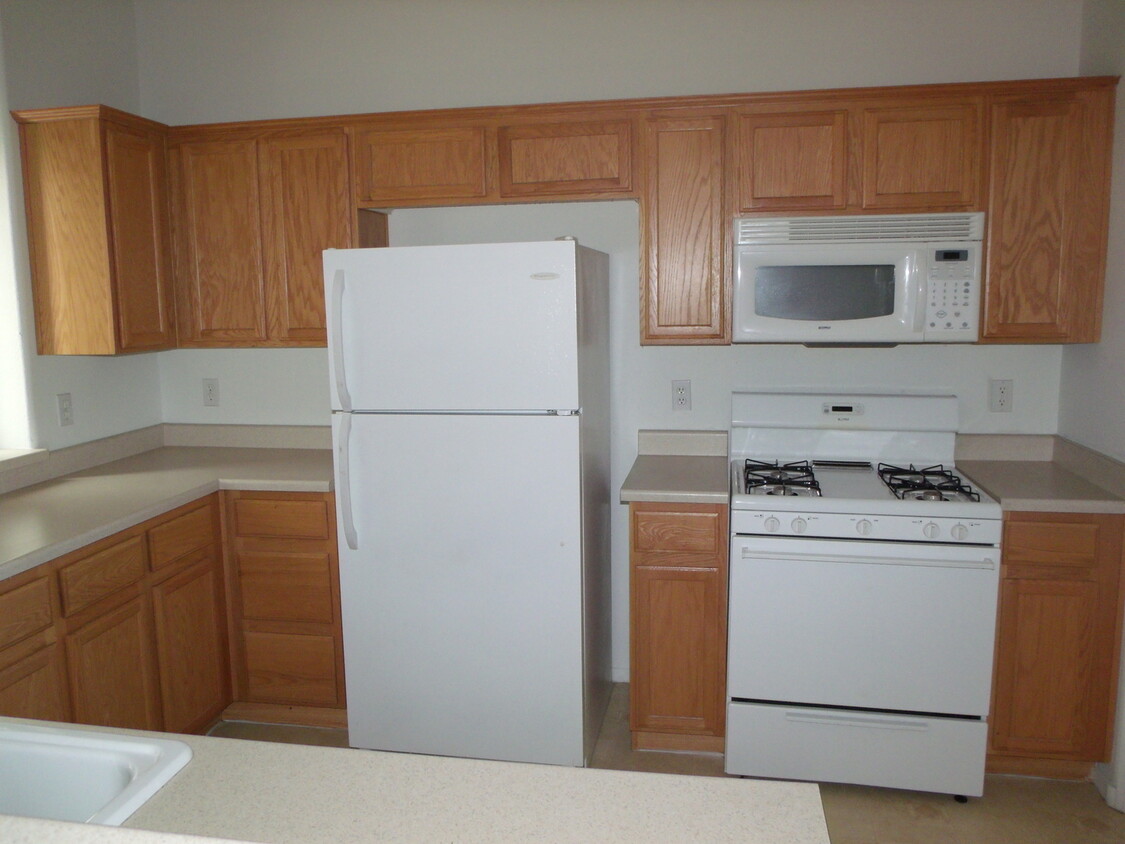 Primary Photo - Townhome with Two Car Attached Garage/Gate...