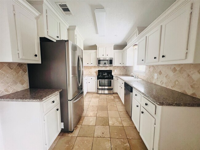 Foto del edificio - 1910 Huge Oaks St