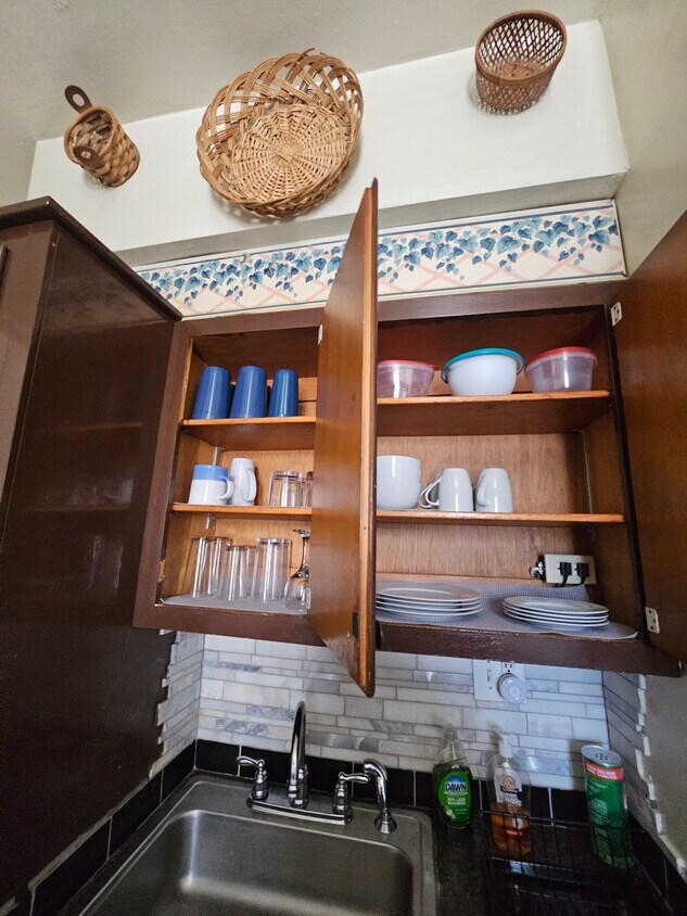 Kitchen, cabinets loaded with dishes, silverware, glasses, pots and pans - 314 Hays Ave