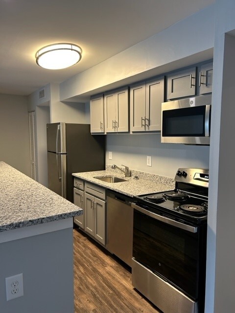 2 bedroom kitchen, stainless steel appliances - Gateway Apartments