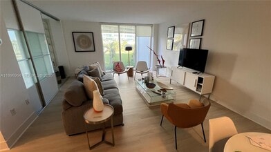 Building Photo - 10275 Collins Ave