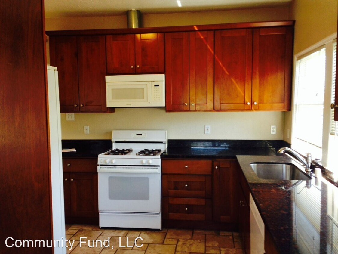 Building Photo - 3 br, 1.5 bath House - 2231 42nd Ave.