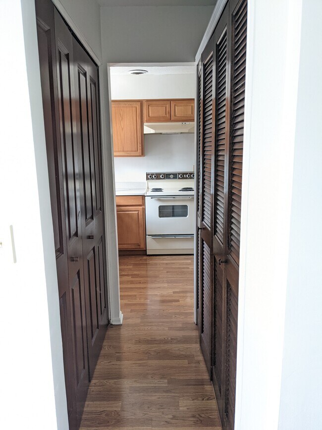Laundry room through doors on left - 4928 Vermont Ln