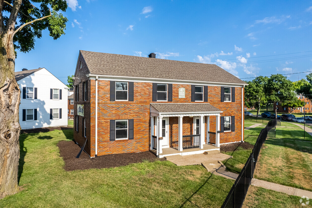 Primary Photo - Plaza East Townhomes and Apartments