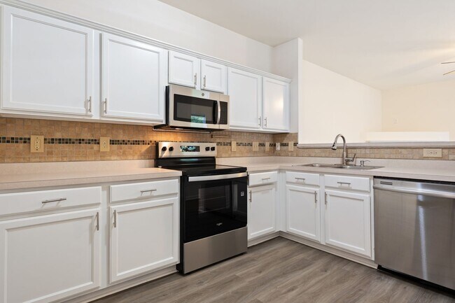 Foto del edificio - Lovely 2-Bedroom Townhome in the Heart of ...