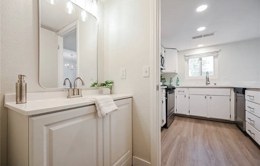 Downstairs half bathroom - 130 Bel Port Dr