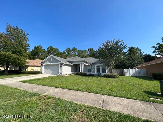 Building Photo - 11335 Justin Oaks Dr N