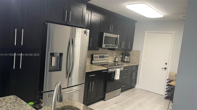 Building Photo - 10138  Royal Palm Blvd  401-4 Coral Spring...