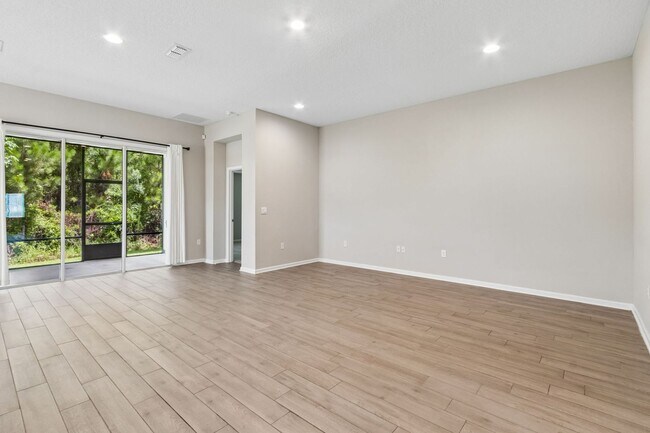 Foto del edificio - Modern 4BR Home with 3 Full Baths in River Glen | Screened Porch & Resort-Style Amenities