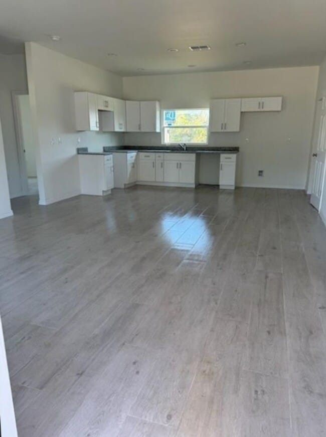 Building Photo - BRAND NEW THREE BEDROOM, 2 BATH, 1 CAR GAR...