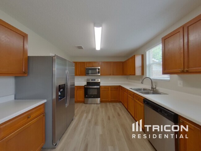 Foto del edificio - 5009 River Rock Blvd