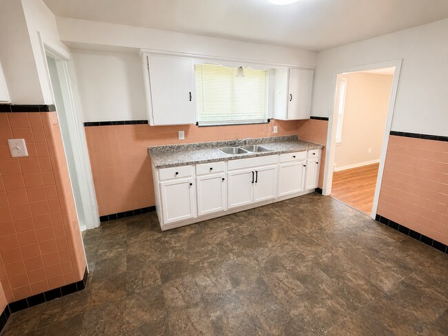 Building Photo - 3BR Eastside Bungalow with Wood Floors, Garage & Full Basement