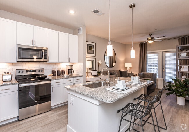 1BR, 1BA - 634SF "Neches"Kitchen & Living - Riverhaus Creekside