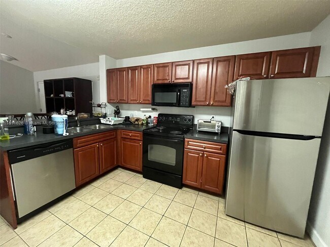Foto del edificio - 10141 W Sunrise Blvd