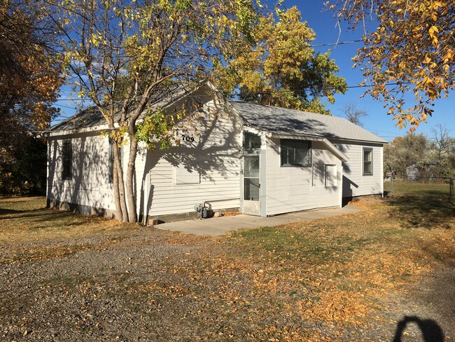 SW corner of house & main entry - 709 9th Ave SW