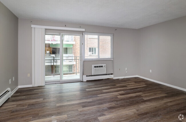 2BR, 1BA - 850SF - Living Room - Malom Trust Apartments