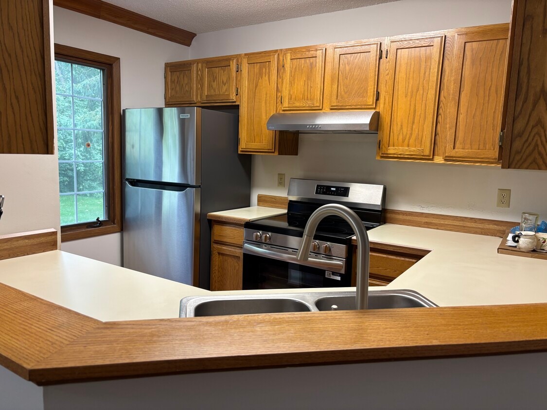 Kitchen overlooking dining and living rooms - 3563 Blue Jay Way