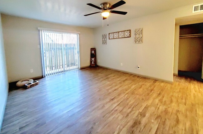 Renovated livingroom - The Oaks Apartments