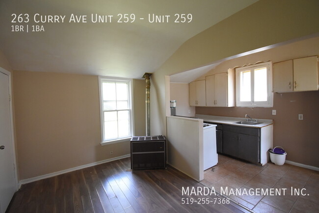 Building Photo - COZY 1-BEDROOM/1BATH MAIN FLOOR APARTMENT ...