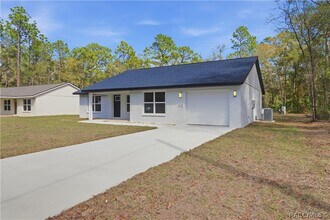 Building Photo - 8341 N Pine Needle Terrace