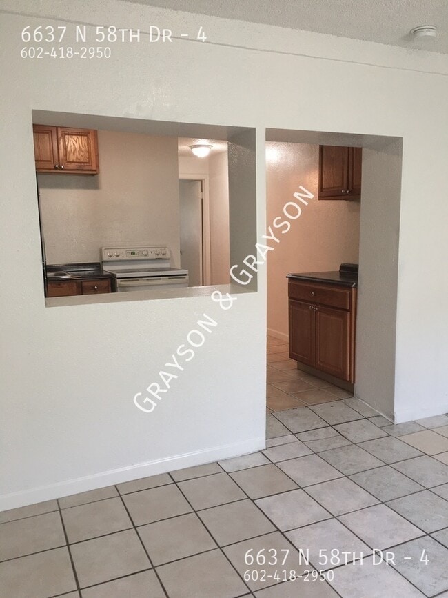 Foto del edificio - 6637 N 58th Dr