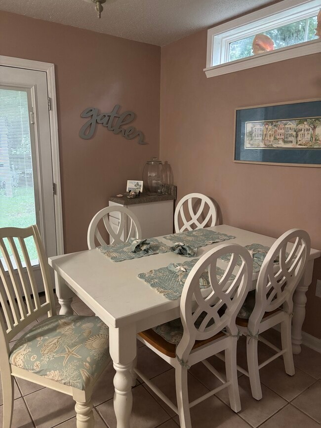 Dining area beside kitchen. - 614 4th Ave S