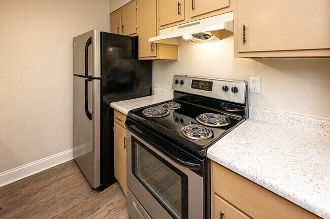 Casa adosada de 2 habitaciones y 1,5 baños, 982 pies cuadrados, cocina - Magnolia Ridge Apartments
