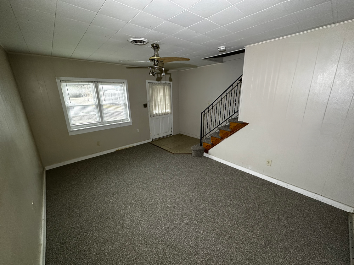 Enter into the family room with plenty of room for your sofas and TV - 6 Catawba Ave