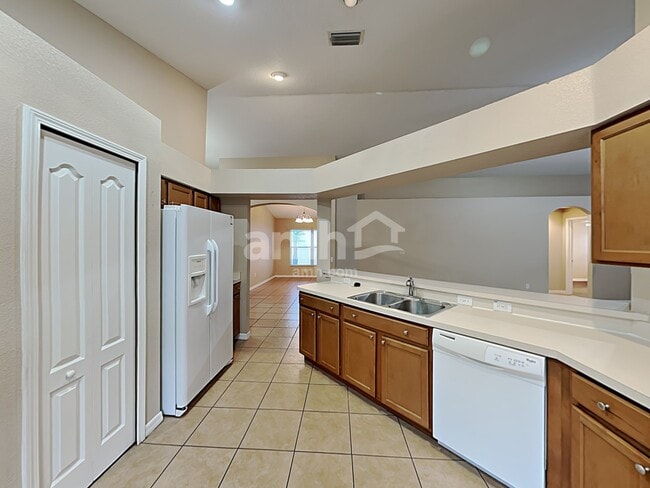 Foto del edificio - 8125 Alamosa Wood Ave