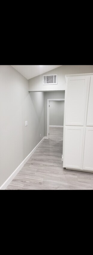 Hallway to kitchen - 15117 S Normandie Ave