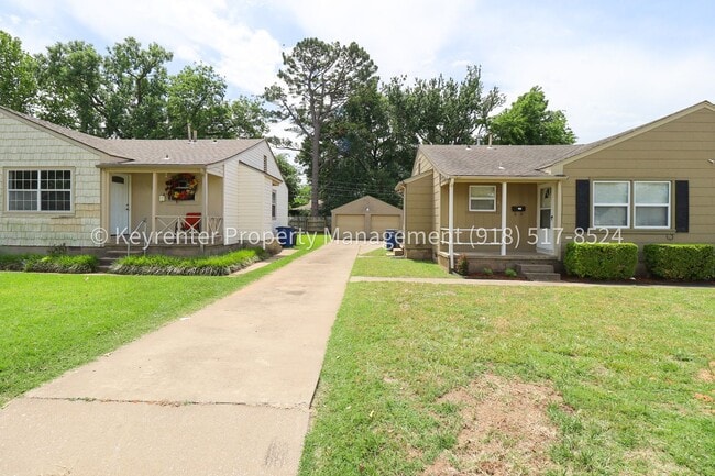 Building Photo - Gorgeous duplex unit on large lot with garage -- NO PETS ALLOWED