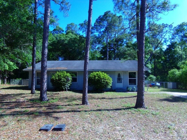 Building Photo - 2BR/1BA Milton Duplex with Huge Fenced Backyard, Tile Flooring Throughout & Convenient Access to ...