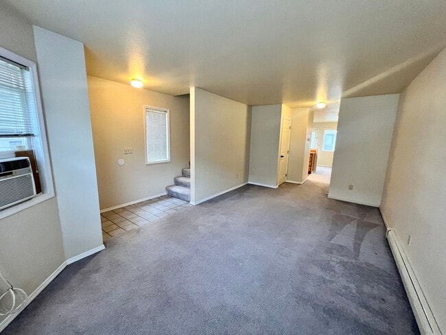 Building Photo - Corner Condo Unit with Private 1-Car Garage