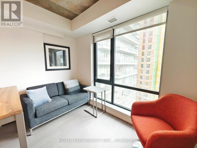 Building Photo - 105 Champagne Ave S