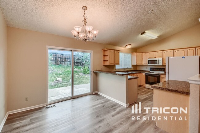 Foto del edificio - 11897 W Bowles Cir