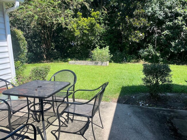 Building Photo - Available now. Great 4BR/3BA Home in Carol...
